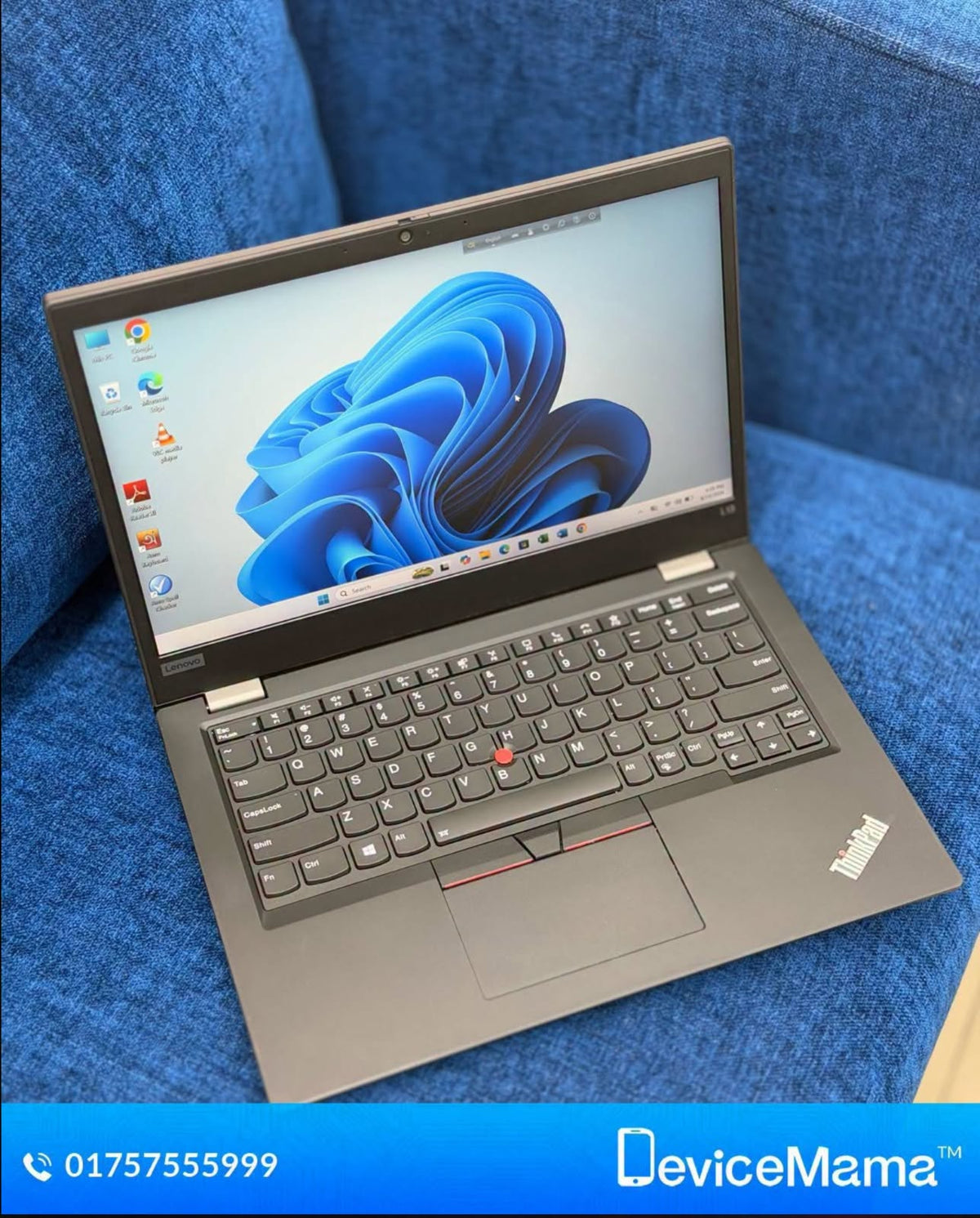 Lenovo ThinkPad L13 laptop in dark gray with a matte finish, black keyboard, red TrackPoint, and 13-inch screen showing Windows 11.
